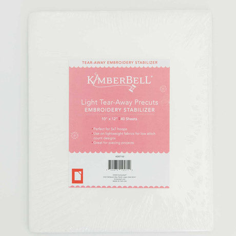 Kimberbell-Light Tear Away stabilizer by Kimberbell is color-coded in a light pink to reflect that this tear away will tear away neatly and cleanly with low stitch count designs. The 10" x 12" sheets are pictured, but the stabilizer is also available in 12" x 10 yard and 20" x 10 yard rolls. A coordinating slap band in light pink to keep the stabilizers organized and identifiable is also available.