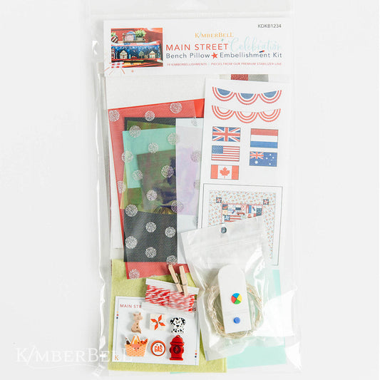 Kimberbell’s Main Street Celebration Embellishment Kit includes all the down-home details to complete your bench pillow, including Fairy Lights, mylar, applique glitter, buttons, vinyl, fabric details, and more!