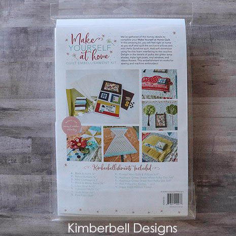 In the Kimberbell Make Yourself at Home Embellishment Kit (KDKB155), we gathered all the homey details to complete your quilt. In this amazing kit, you will feel right as home as you stuff and quilt pillows, and the exclusive Mini Hello Sunshine quilt to hang from the trees. Delight in the details of polka dot glitter lamp shades, mylar light posts, vinyl windows, and dimensional ribbon flowers.