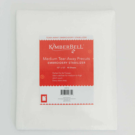 Kimberbell Medium Tear Away stabilizer by Kimberbell is color-coded in a red to reflect that this tear away will tear away neatly and cleanly with medium to high stitch count designs. The 10" x 12" sheets are pictured, but the stabilizer is also available in 12" x 10 yard and 20" x 10 yard rolls. A coordinating slap band in red to keep the stabilizers organized and identifiable is also available.