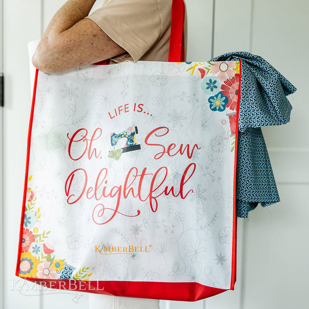 Carry fabric, notions, instructions, and more in Kimberbell’s Oh, Sew Delightful Tote (KDMR156)! Our roomy 18 x 18” tote is bright and beautiful, with sturdy handles and darling designs.