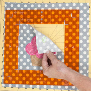 Place It, Cut It, Piece It! The Orange Pop Square Rulers (KDTL101) by Kimberbell are phenomenal rulers with extended corner channels, make squaring up quilt blocks simple and accurate. Visually center embroidery and applique designs before you cut.