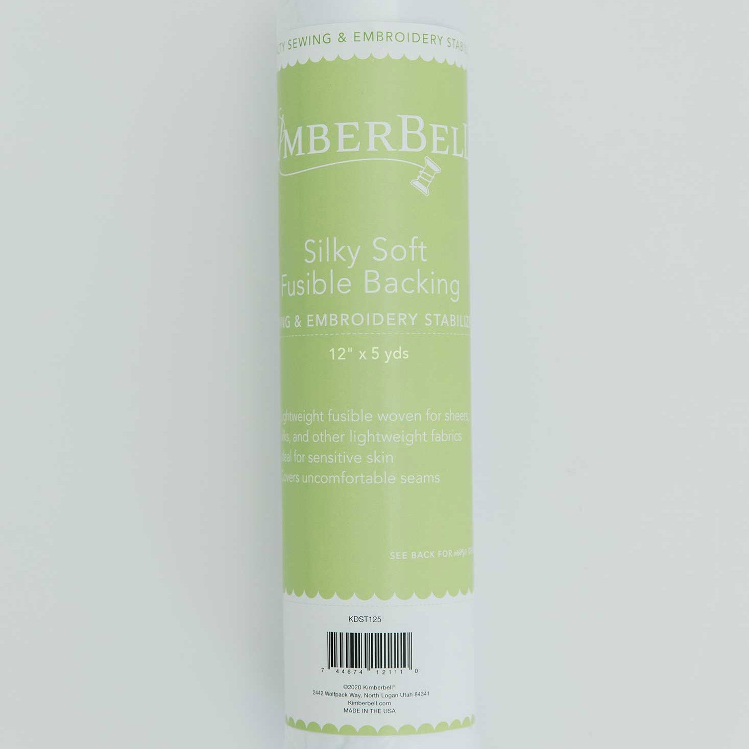 Silky Soft Fusible Backing (KDST125) by Kimberbell is color-coded in green to show it isa specialty stabilizer. It is a lightweight fusible woven for sheers, silks, and other lightweight fabrics to cover uncomfortable seams and for sensitive skin.  It is available in a 12" x 5 yard roll. Stitcher’s Joy