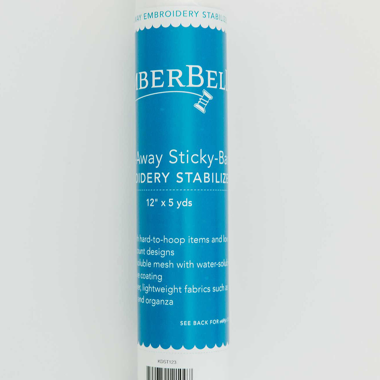 Wash Away Sticky-back stabilizer by Kimberbell is color-coded in blue to reflect it is for use with water to completely dissolve for hard to hoop projects such as chiffon, organza, or other sheer fabrics. The 12" x 5 yard size (KDST123) is pictured, but the stabilizer is also available in a 20” x 5 yard roll. Stitcher’s Joy