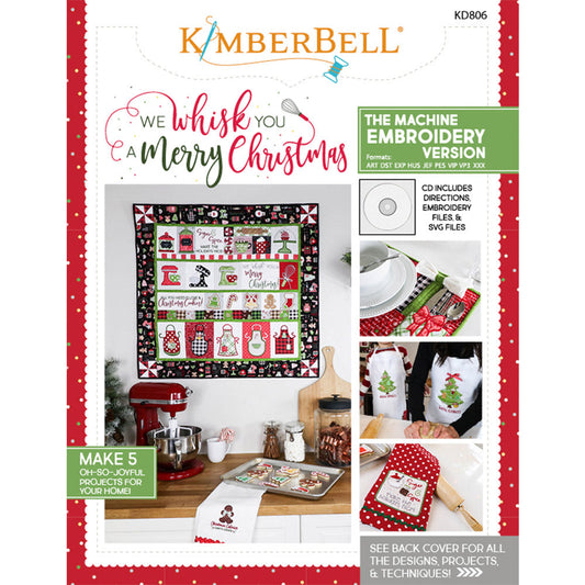 We “Whisk” You a Merry Christmas (KD806) is Kimberbell’s feature quilt and holiday tribute to sweet Christmas confections and even sweeter traditions and memories. Dimensional elements include flexible foam whipped cream, marshmallow poms, a clear vinyl cake dome, applique glitter countertop mixers, and more! Picture shows front cover of pattern book.